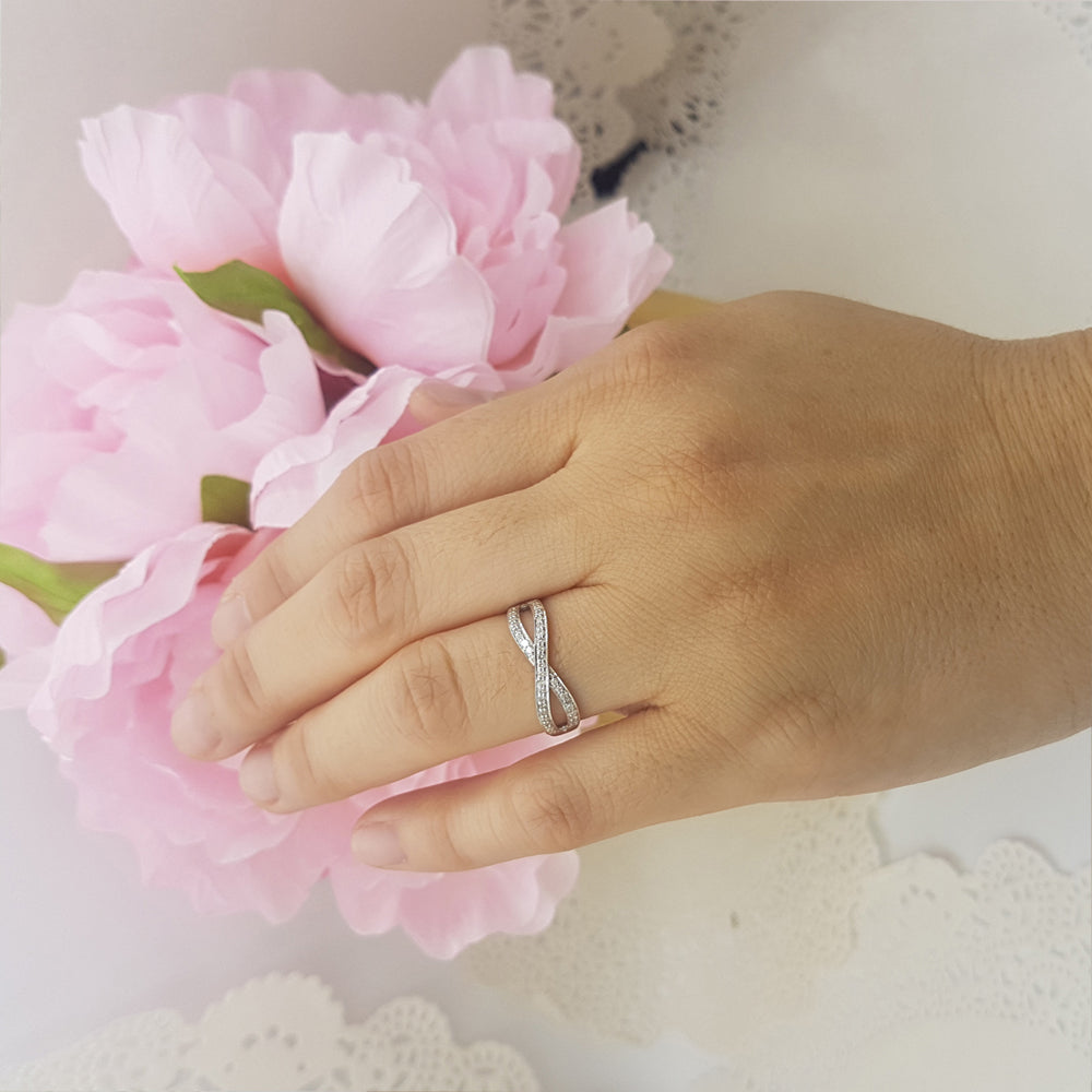 0.20 Carat (ctw) 925 Sterling Silver Round White Diamond Ladies Swirl Anniversary Wedding Band Stackable Ring 1/5 CT