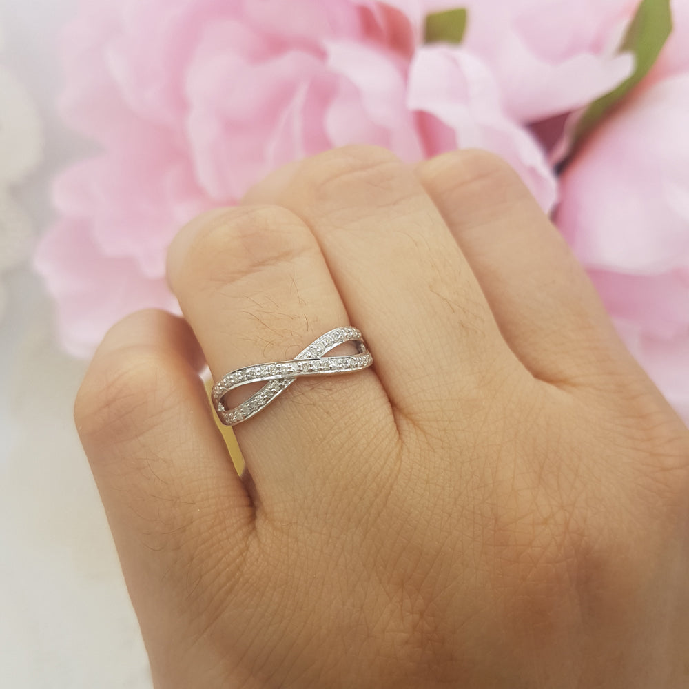 0.20 Carat (ctw) 925 Sterling Silver Round White Diamond Ladies Swirl Anniversary Wedding Band Stackable Ring 1/5 CT