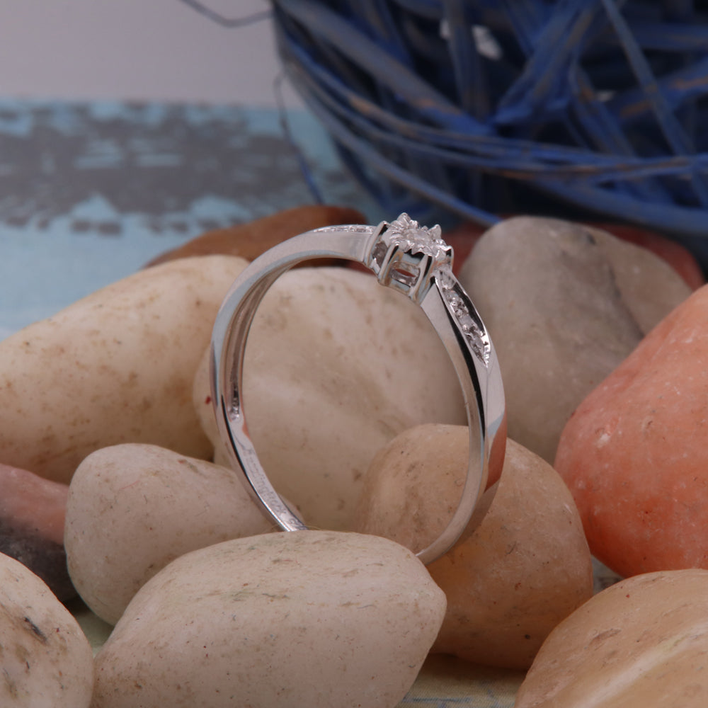 0.08 Carat (ctw) Sterling Silver Round White Diamond Ladies Solitaire With Accent Engagement Bridal Promise Ring