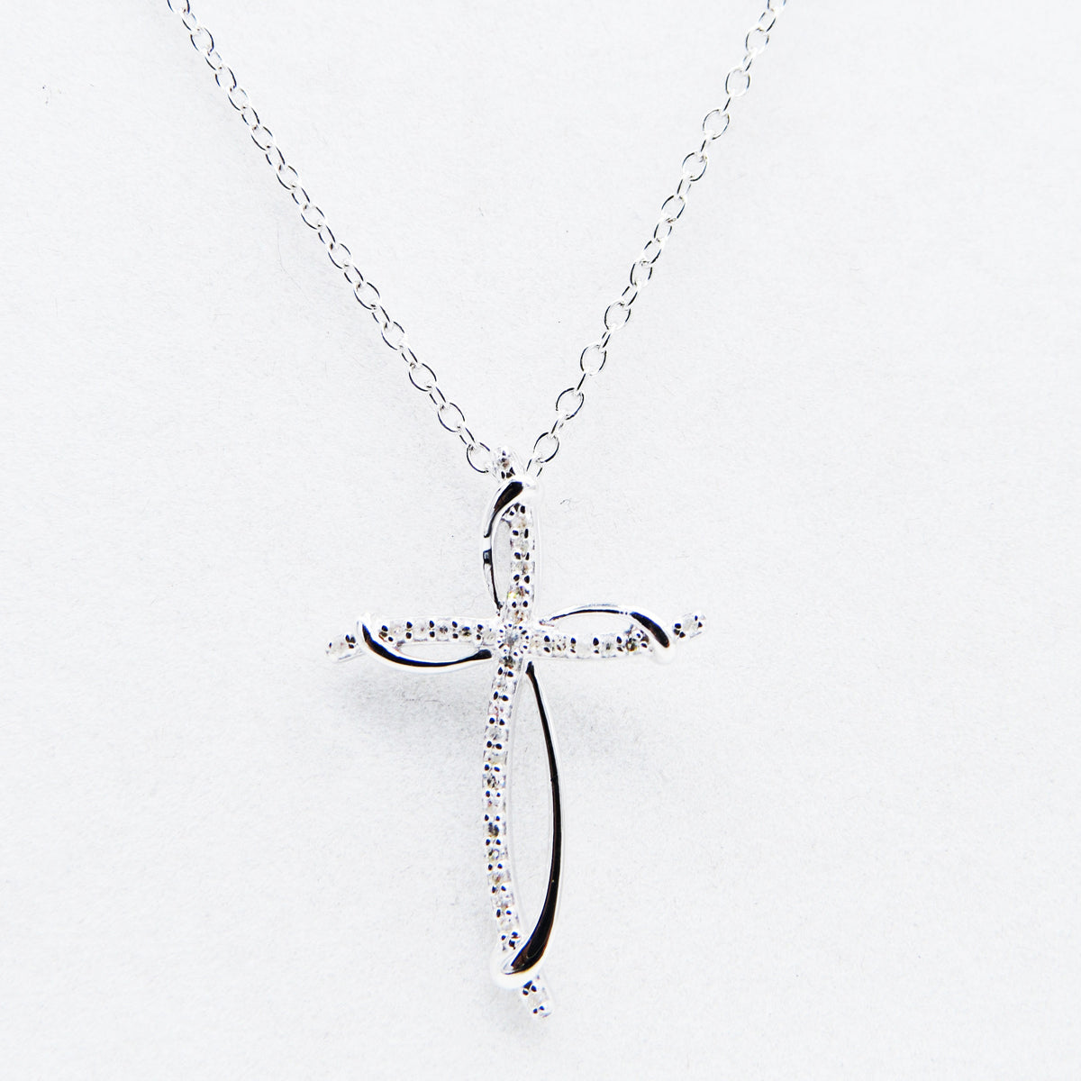 0.10 Carat (ctw) Sterling Silver Round Diamond Ladies Cross Pendant(Necklace) 1/10 CT (Silver Chain Included)